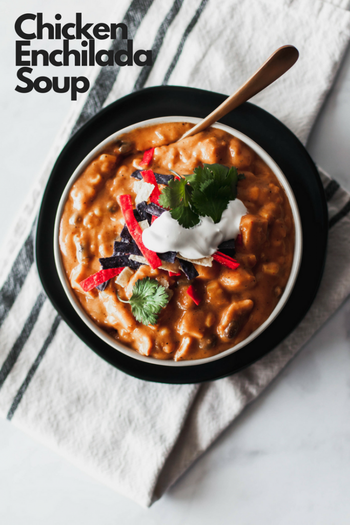 Chicken Enchilada Soup is creamy, spicy and packed full of enchilada flavor. The perfect slow cooker soup for fall.