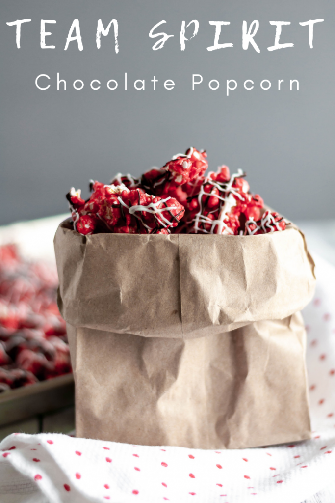 Team Spirit Chocolate Popcorn is the best way to watch your favorite team on game day. Use your teams colors to make this super simple, sweet treat.