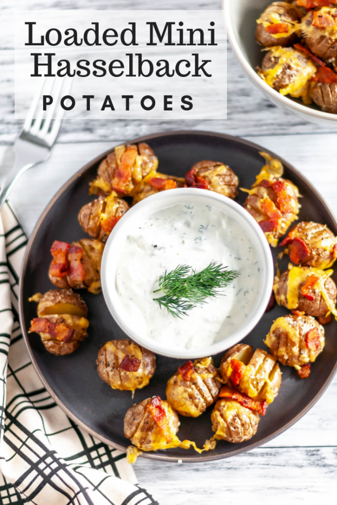 Loaded Mini Hasselback Potatoes are a delicious and adorable party appetizer your holiday needs. Serve with this simple, fresh dill sour cream.