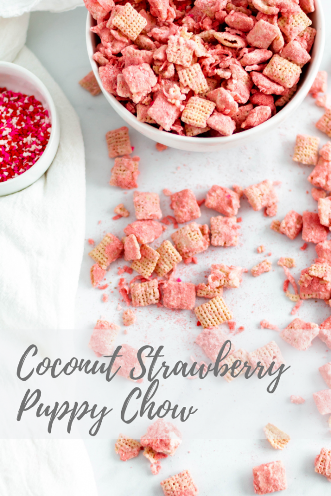 Make your Valentines Day festive with this Coconut Strawberry Puppy Chow. White chocolate, freeze dried strawberries & coconut are such a sweet combination.