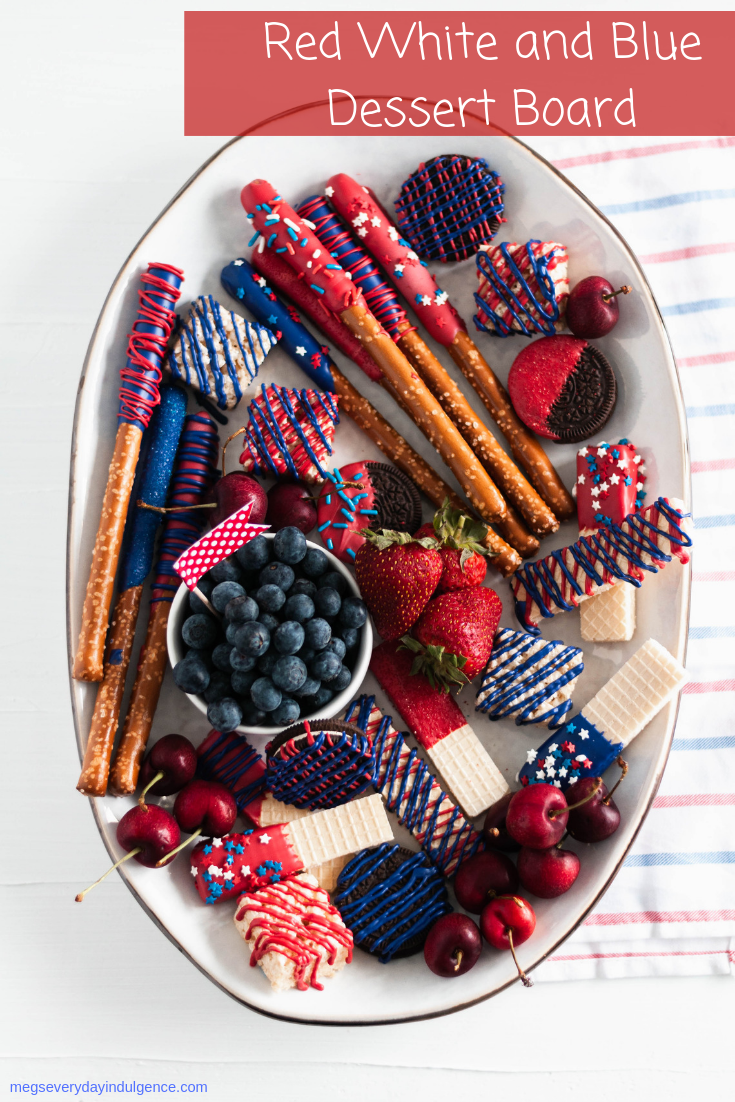 You'll be the hit of the 4th of July party when you show up with this Red White and Blue Dessert Board. Super simple to make with store-bought ingredients, some time and all your creative juices.