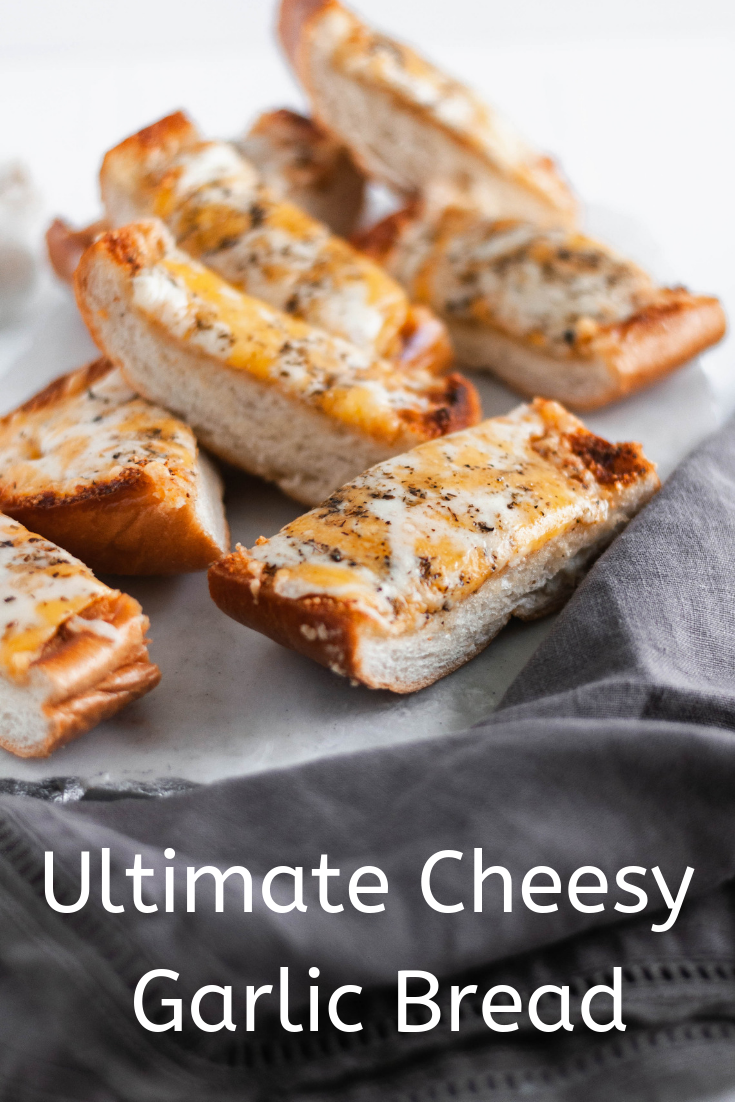 This Ultimate Cheesy Garlic Bread is the perfect addition to dinner tonight. Buttery garlic bread smothered in three cheeses and Italian seasoning.
