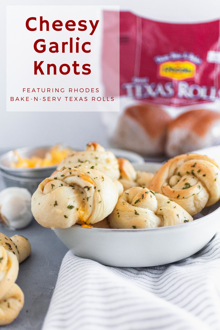 Make these simple, delicious, cheese stuffed Garlic Knots using Rhodes Bake-N-Serv Texas rolls for your next holiday dinner. Simple to make and taste homemade! Check out the step-by-step tutorial for these super simple rolls.