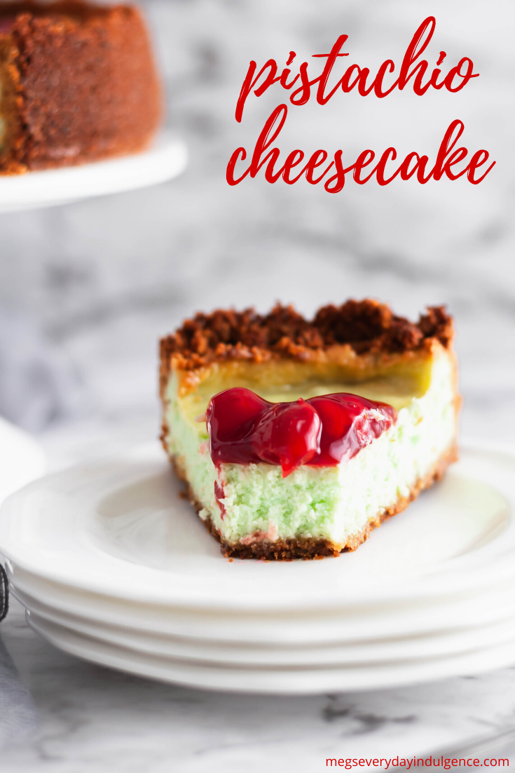 This PIstachio Cheesecake is a delightful holiday dessert. Thick, creamy cheesecake studded with pistachio flavor throughout the filling and crust. Top with cherries to make it extra festive.