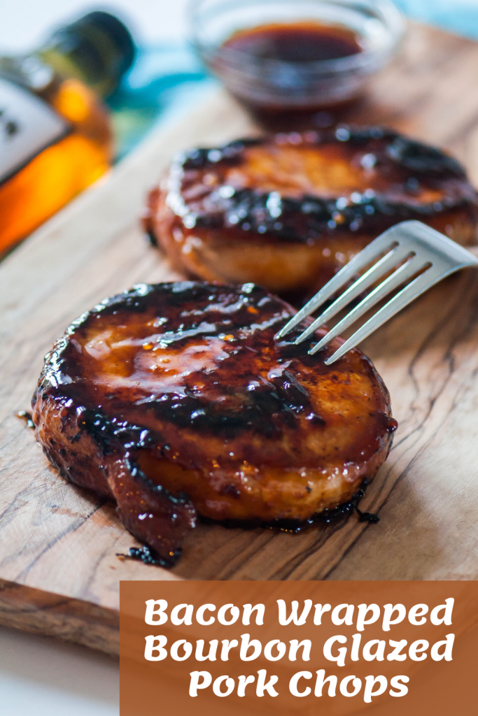 Bacon wrapped pork chops are glazed in a sweet and savory bourbon sauce while cooked to juicy perfection. These Bacon Wrapped Bourbon Glazed Pork Chops are the best way to celebrate something special at home or just because.