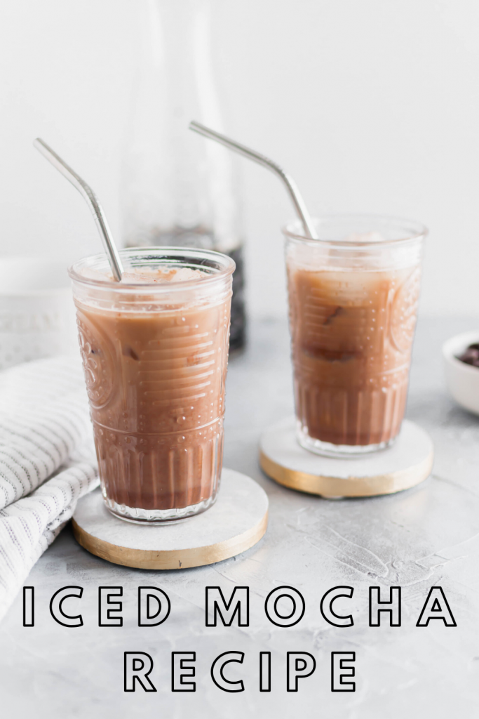 Photo shows two glasses of homemade iced mocha recipe. Missing your favorite coffee shop? Try making a classic at home with this Iced Mocha Recipe. Only three ingredients required!