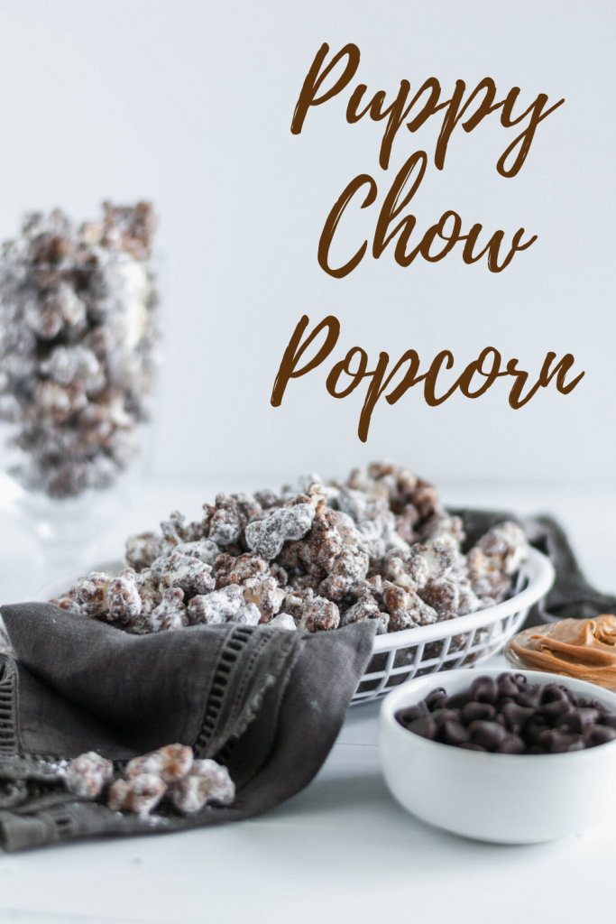 Up your movie night snacking game with this Puppy Chow Popcorn. Melted chocolate and peanut butter drizzled over popcorn and tossed with powdered sugar for the ultimate sweet treat.