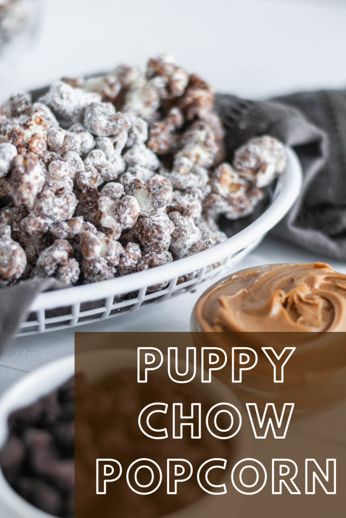 Up your movie night snacking game with this Puppy Chow Popcorn. Melted chocolate and peanut butter drizzled over popcorn and tossed with powdered sugar for the ultimate sweet treat.