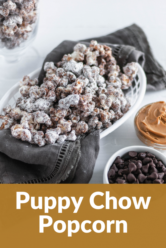 Up your movie night snacking game with this Puppy Chow Popcorn. Melted chocolate and peanut butter drizzled over popcorn and tossed with powdered sugar for the ultimate sweet treat.