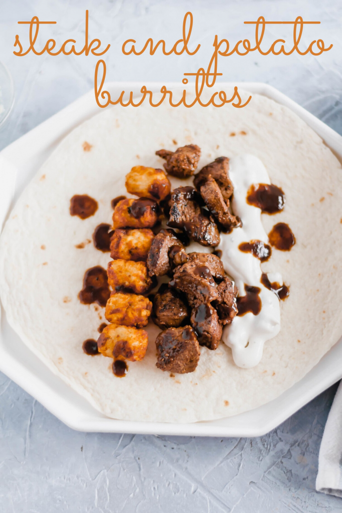 This Steak and Potato Burrito is stuffed with tender seared steak, crispy tater tots, blue cheese dressing and a drizzle of steak sauce. The perfect meal any time of the day.