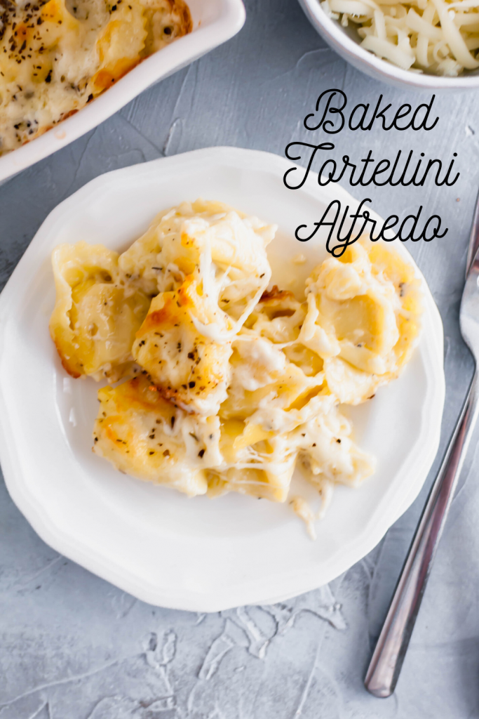 This Baked Tortellini Alfredo is the ultimate comfort food. Cheese tortellini tossed in alfredo sauce, topped with mozzarella and baked to perfection.