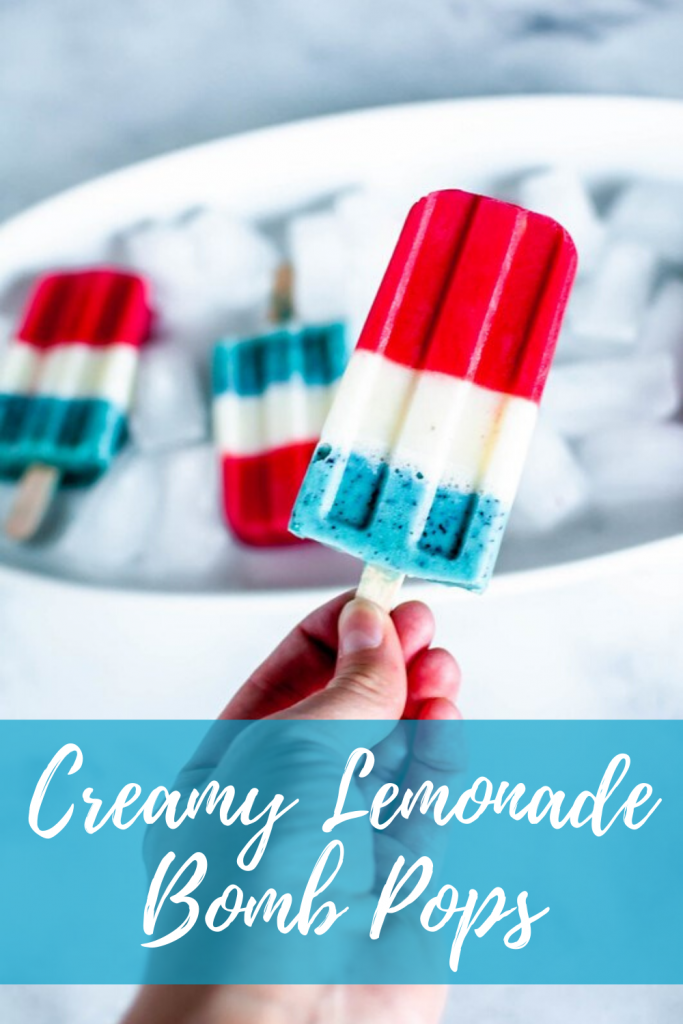 Vanilla frozen yogurt, tart lemonade and fruit combine to make these super fun and festive Creamy Lemonade Bomb Pops. Enjoy one or three while watching your favorite fireworks display this year.