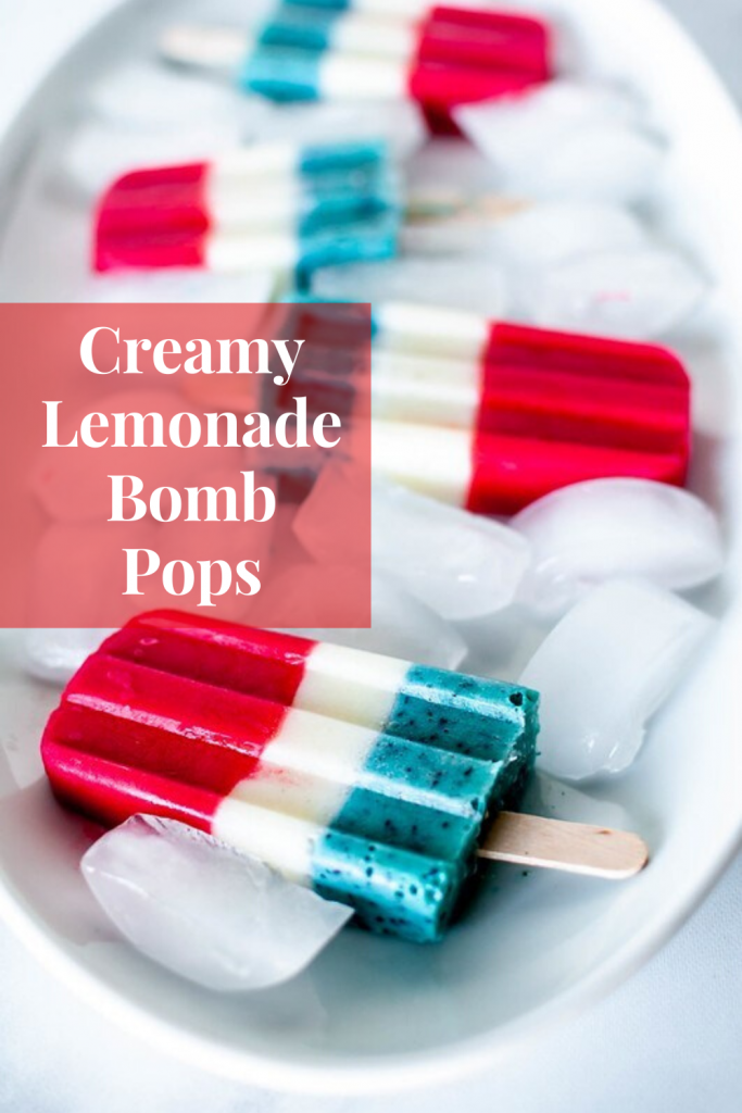 Vanilla frozen yogurt, tart lemonade and fruit combine to make these super fun and festive Creamy Lemonade Bomb Pops. Enjoy one or three while watching your favorite fireworks display this year.