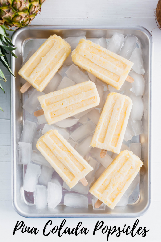These Pina Colada Popsicles will be the treat of summer. Creamy coconut and sweet pineapple make a simple, delicious dessert that tastes just like the classic drink (without the booze).