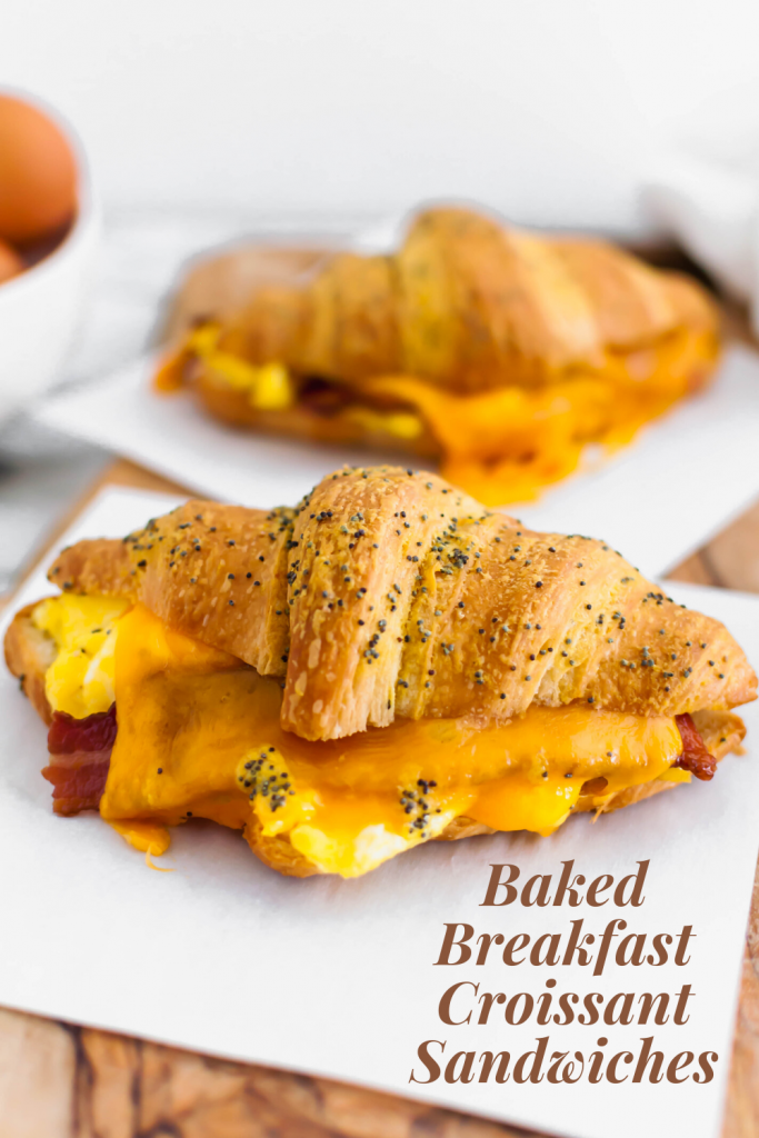 These Baked Breakfast Croissant Sandwiches start with a buttery, flaky croissants and are filled with scrambled eggs, crisp bacon and melted cheddar cheese to create a delicious hand held breakfast to enjoy at home or on the go.