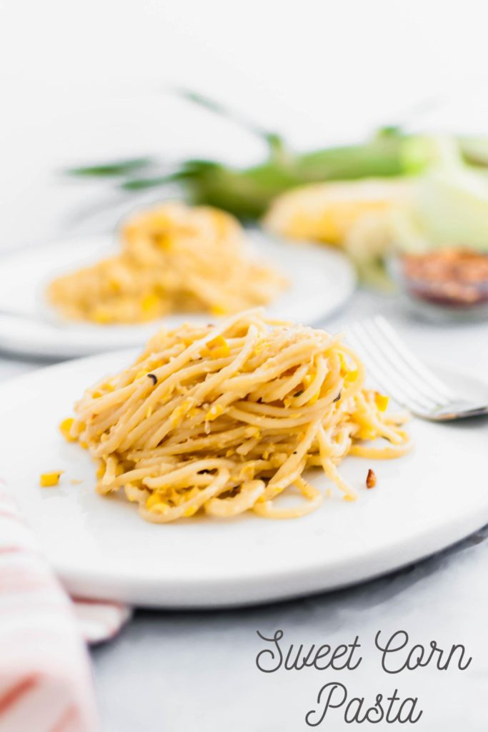 Put all the delicious in season sweet corn to use in this Sweet Corn Pasta. This fun play on alfredo sauce is sure to please the whole family. Done in less than 30 minutes using super simple, easy to find ingredients. Using fresh, local sweet corn is the best for this recipe.