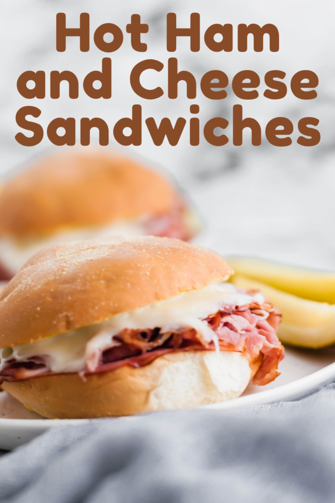 Need an easy lunch or weeknight meal? These Hot Ham and Cheese Sandwiches are the perfect solution. Shaved deli ham (honey ham is my favorite) with melted swiss cheese and a yummy sauce.