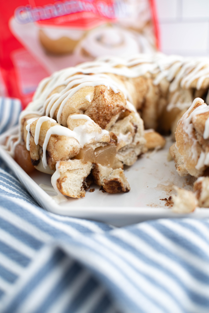 Slice out of apple pie monkey bread to show interior.