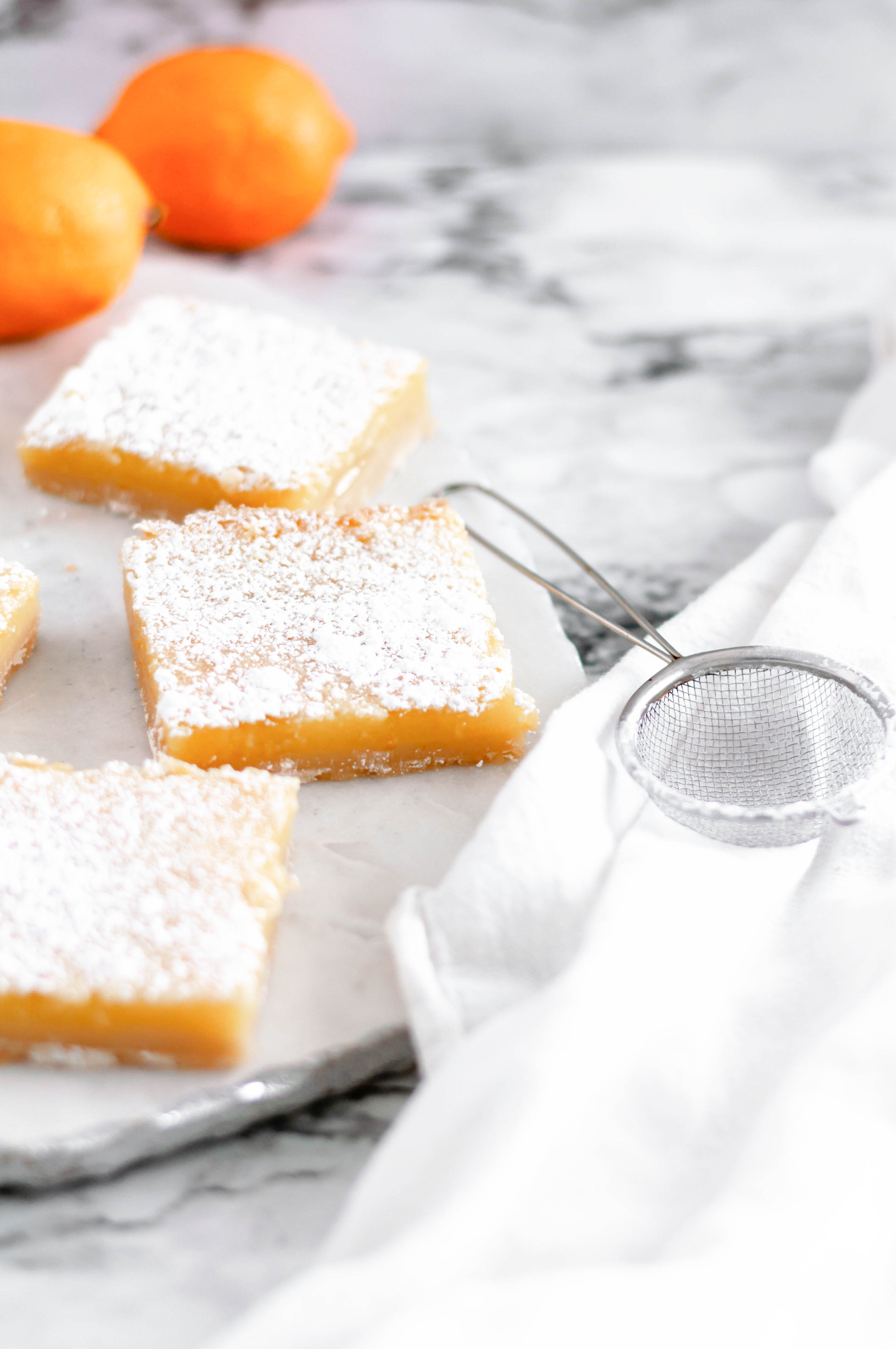 Classic Meyer Lemon Bars are a great option for Easter dessert. Simple to make with a great sweet, tart zing. Crumbly, sweet shortbread and tart meyer lemon filling.