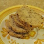 brown butter pecan shortbread slices on a round yellow floral plate