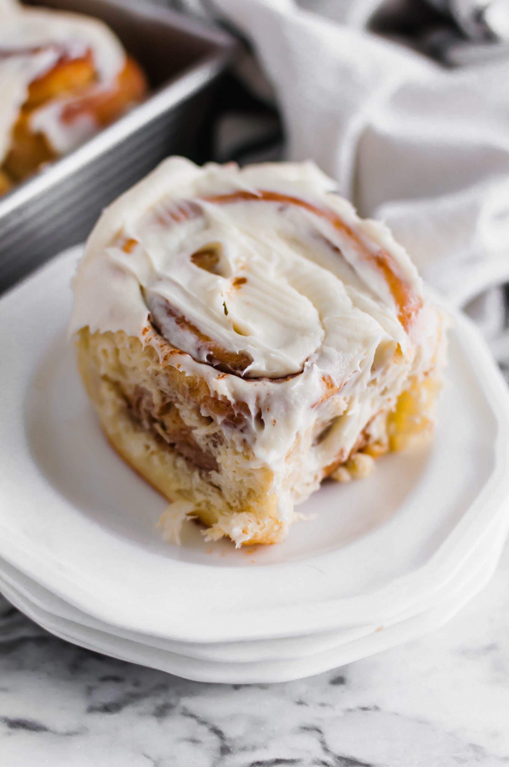 Making you own Copycat Cinnabon Cinnamon Rolls is easier than you may think. You're only a few basic ingredients and 3 hours away from the most delicious cinnamon rolls. Let's get baking.