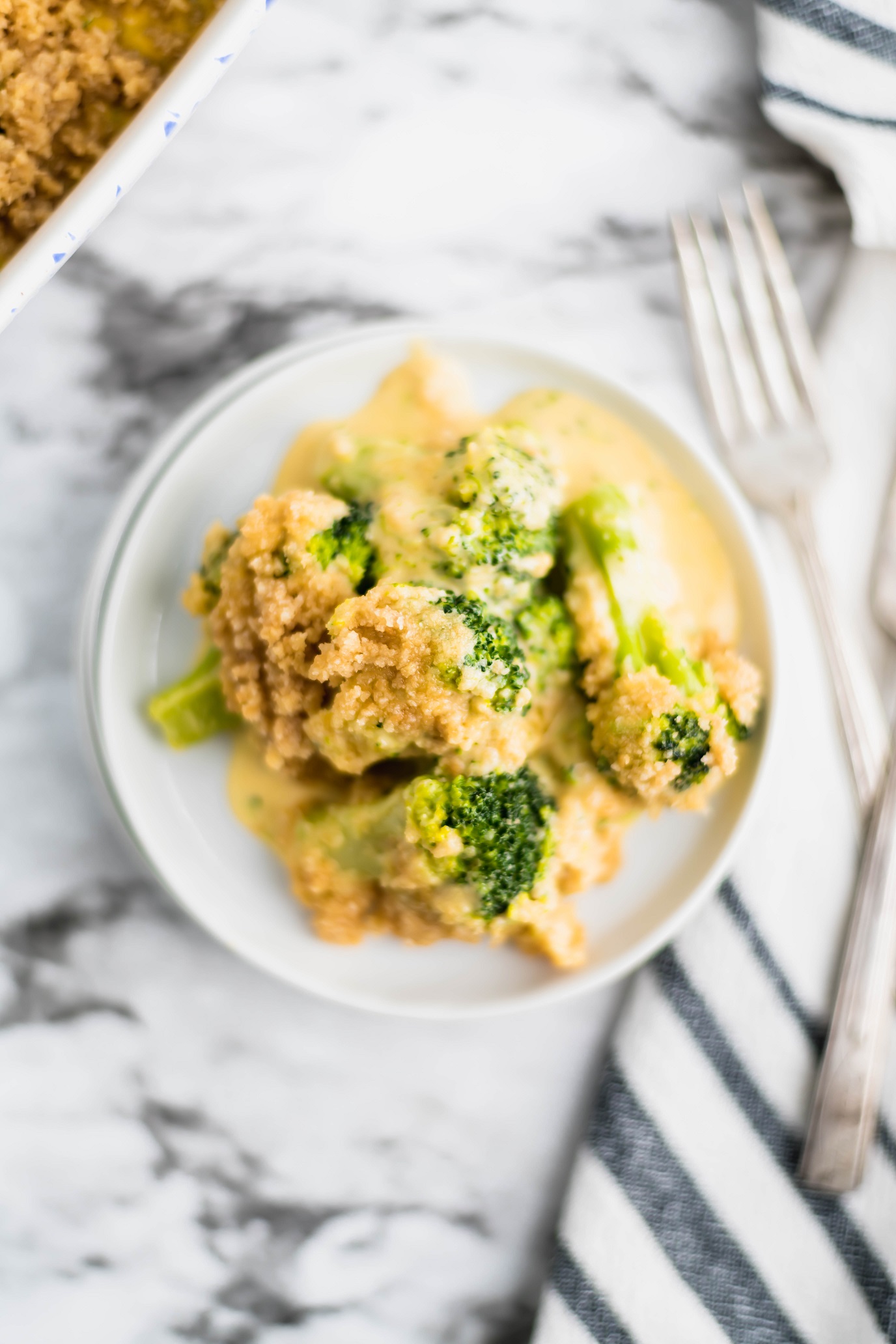 Broccoli Cheese Casserole is a super easy, totally addictive casserole that's perfect for the holidays. Only 4 ingredients needed for this cheesy vegetable side dish.