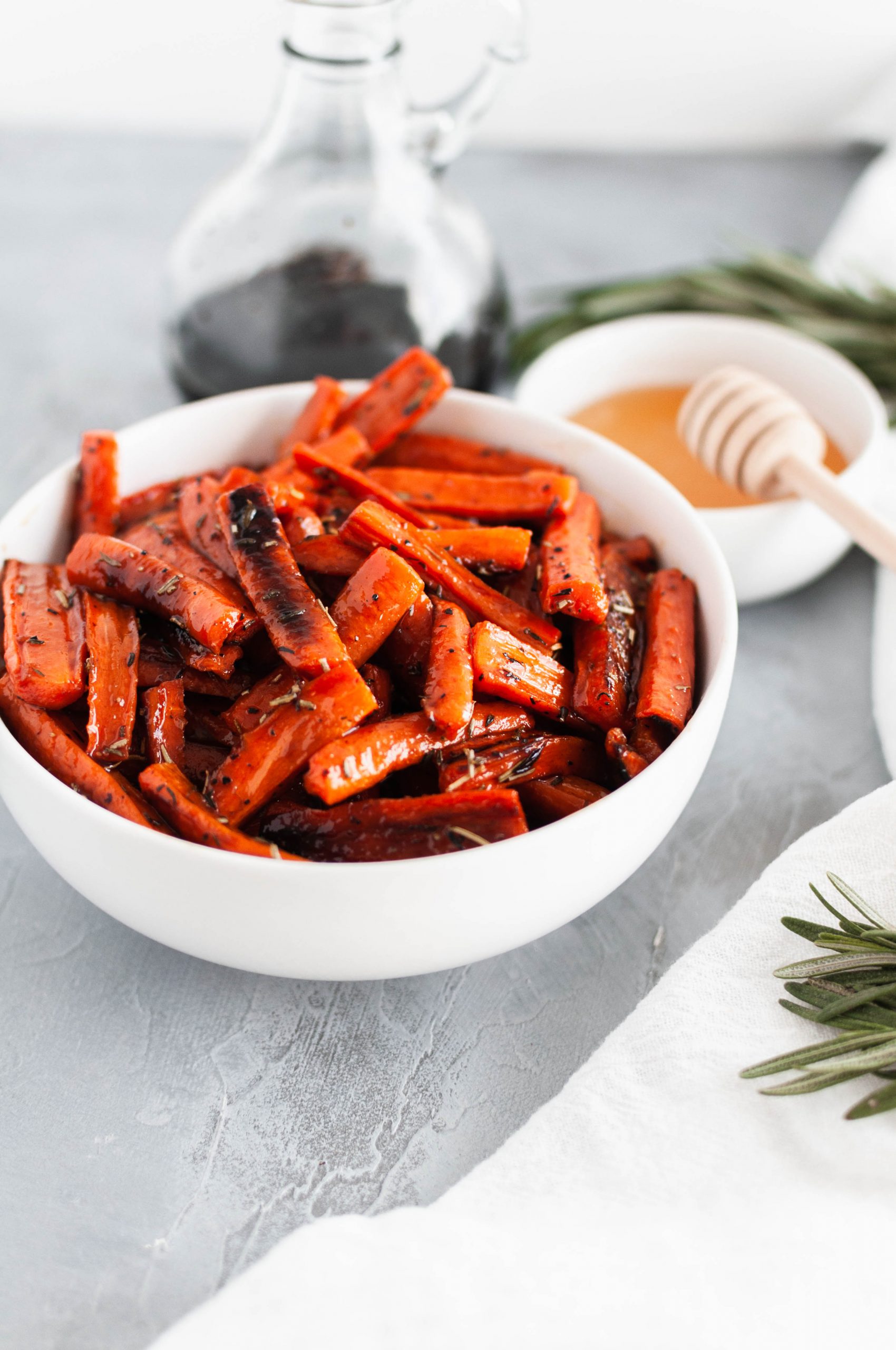 Honey Balsamic Roasted Carrots are a simple and delicious side dish for weeknights or holidays. Slightly tangy and sweet.