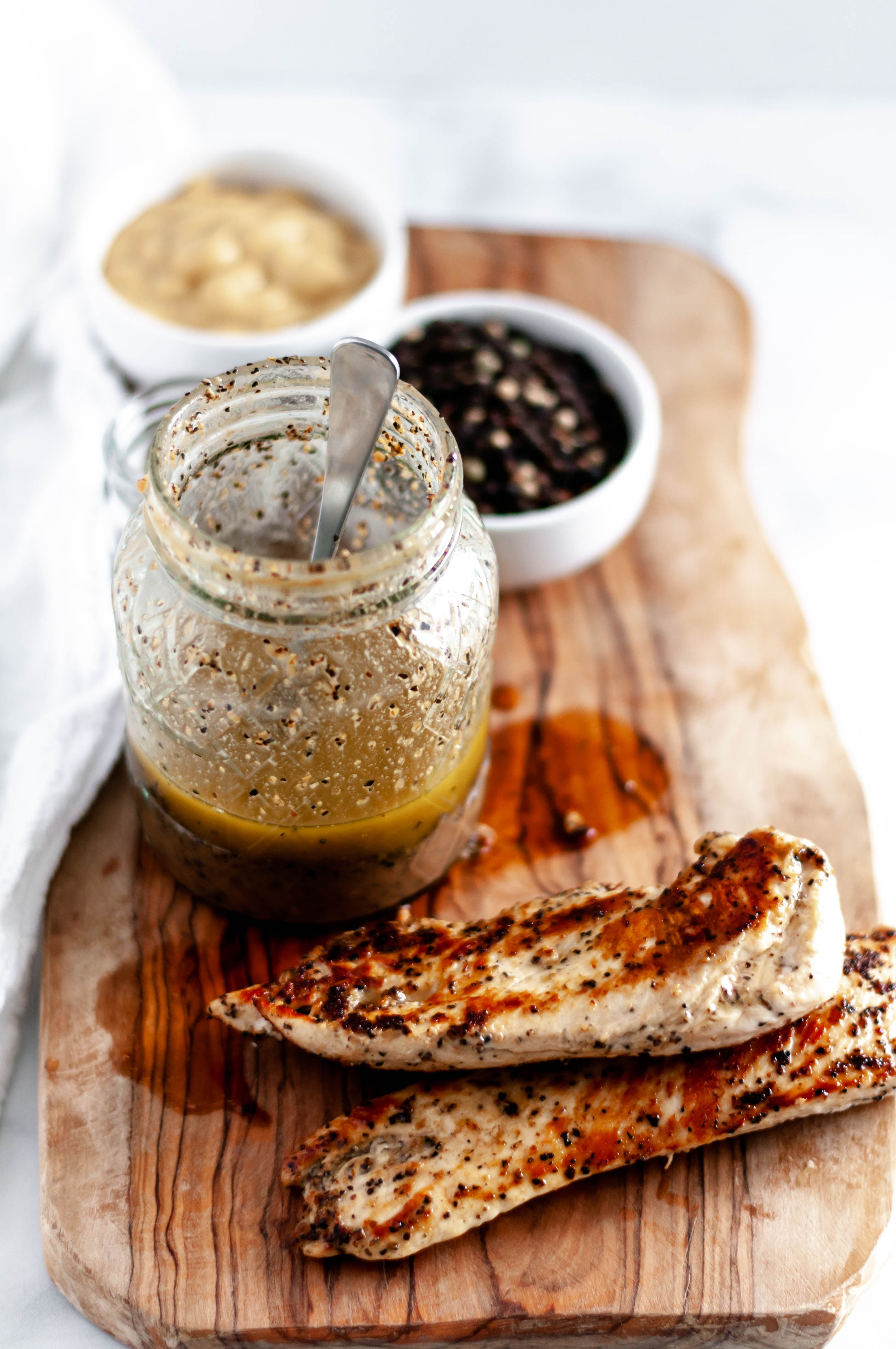 This super simple black peppercorn marinade will bring all the flavor to your chicken, beef, pork and veggies. Keep it on hand all summer long.