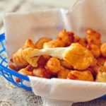Beer Battered Cheese Curds are the only appetizer you'll ever need. Stringy, melted cheese in a crispy beer batter.