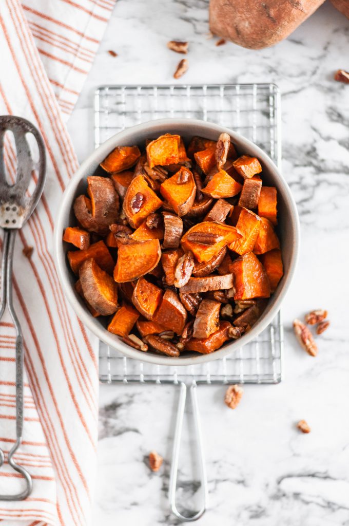 These Roasted Sweet Potatoes with buttery pecans are the perfect simple and easy side dish to add to your holiday menu. Less than 40 minutes from start to finish and you'll have sweet, tender, crunchy, buttery goodness on your dinner table.