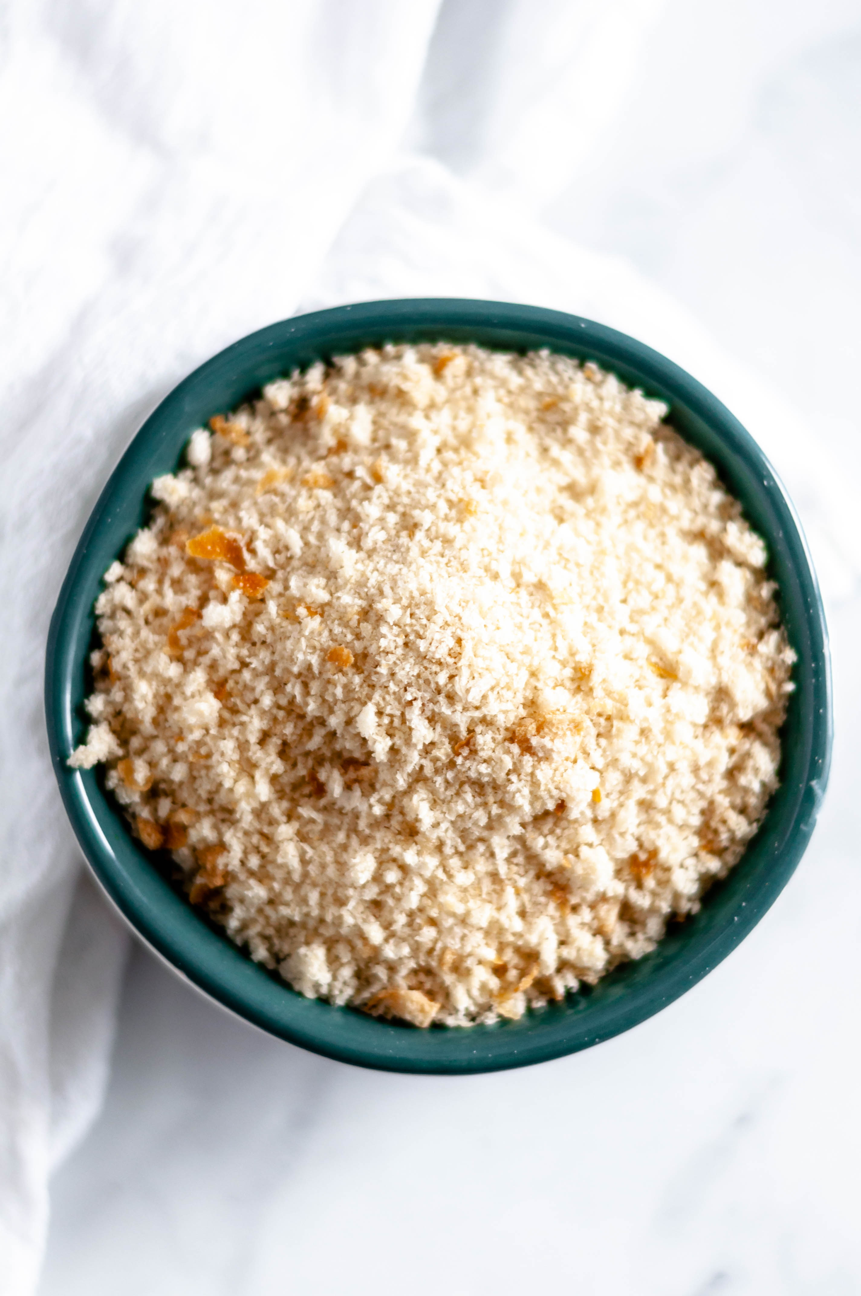 Don't throw away that stale bread in your cabinet. Instead, use it to make Homemade Bread Crumbs. They are super simple to make and can be used in all your favorite recipes.