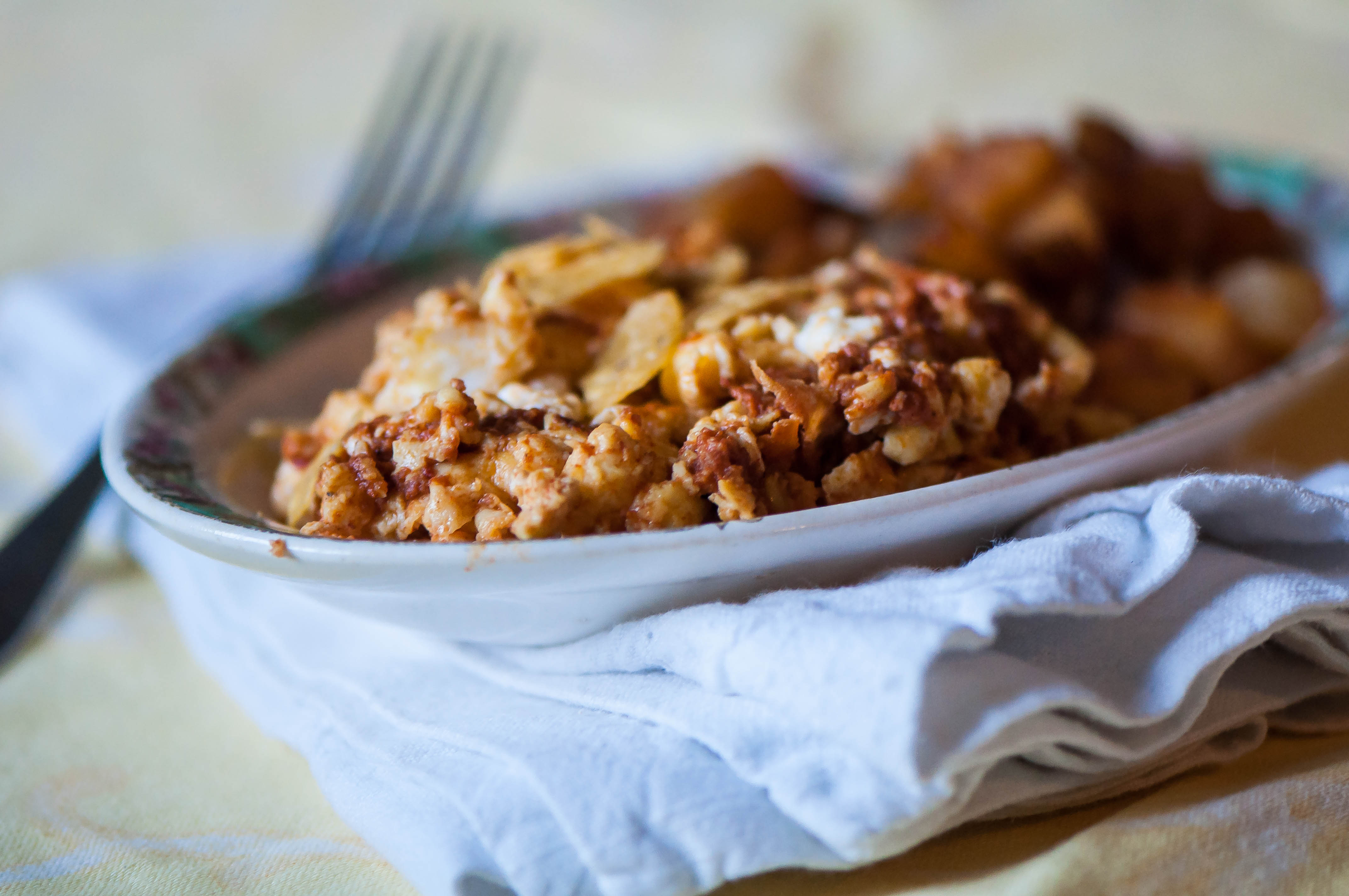 This Chorizo Scramble will become your favorite new quick and ultra flavorful breakfast. Scrambled eggs, spicy chorizo, crumbled queso fresco and crushed tortilla chips. Top with a little sour cream.