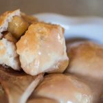 Two favorites combine to create a delicious new treat, Apple Pie Cinnamon Roll Bombs. Store-bought biscuits, spiced apples and drippy glaze.
