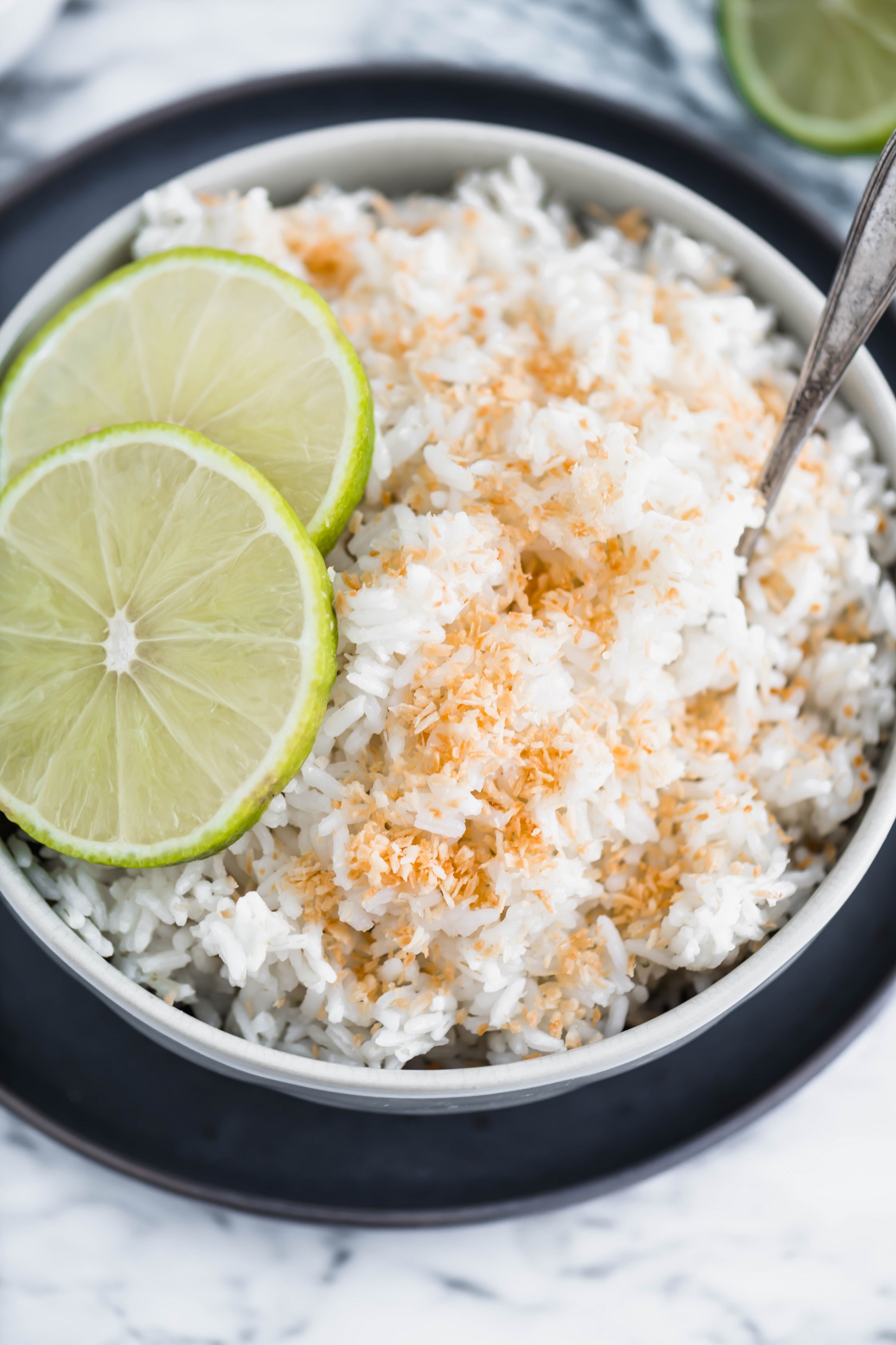 Instant Pot Coconut Lime Rice is a delicious and simple side dish worthy of busy weeknights and dinner party guests. Full of tropical flavors and done in minutes.