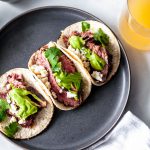 If you're in the Taco Tuesday everyday camp, you don't want to miss these Beer Marinated Steak Tacos. Slightly citrusy, char grilled and topped with a deliciously creamy avocado sauce these will be the star of your next gathering.