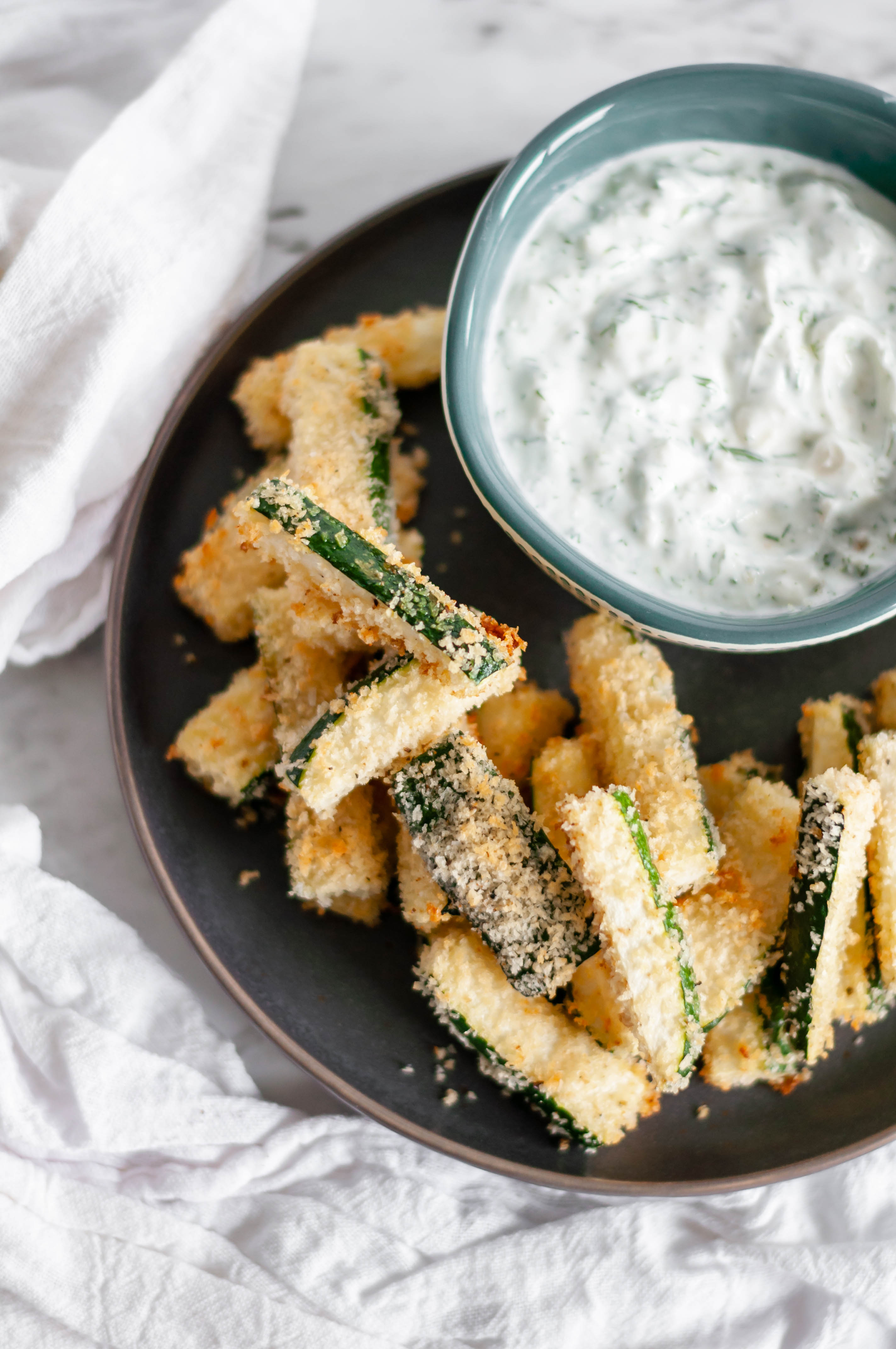 Crispy Zucchini Fries with Dill Feta Dip are super crispy and oven baked to perfection.