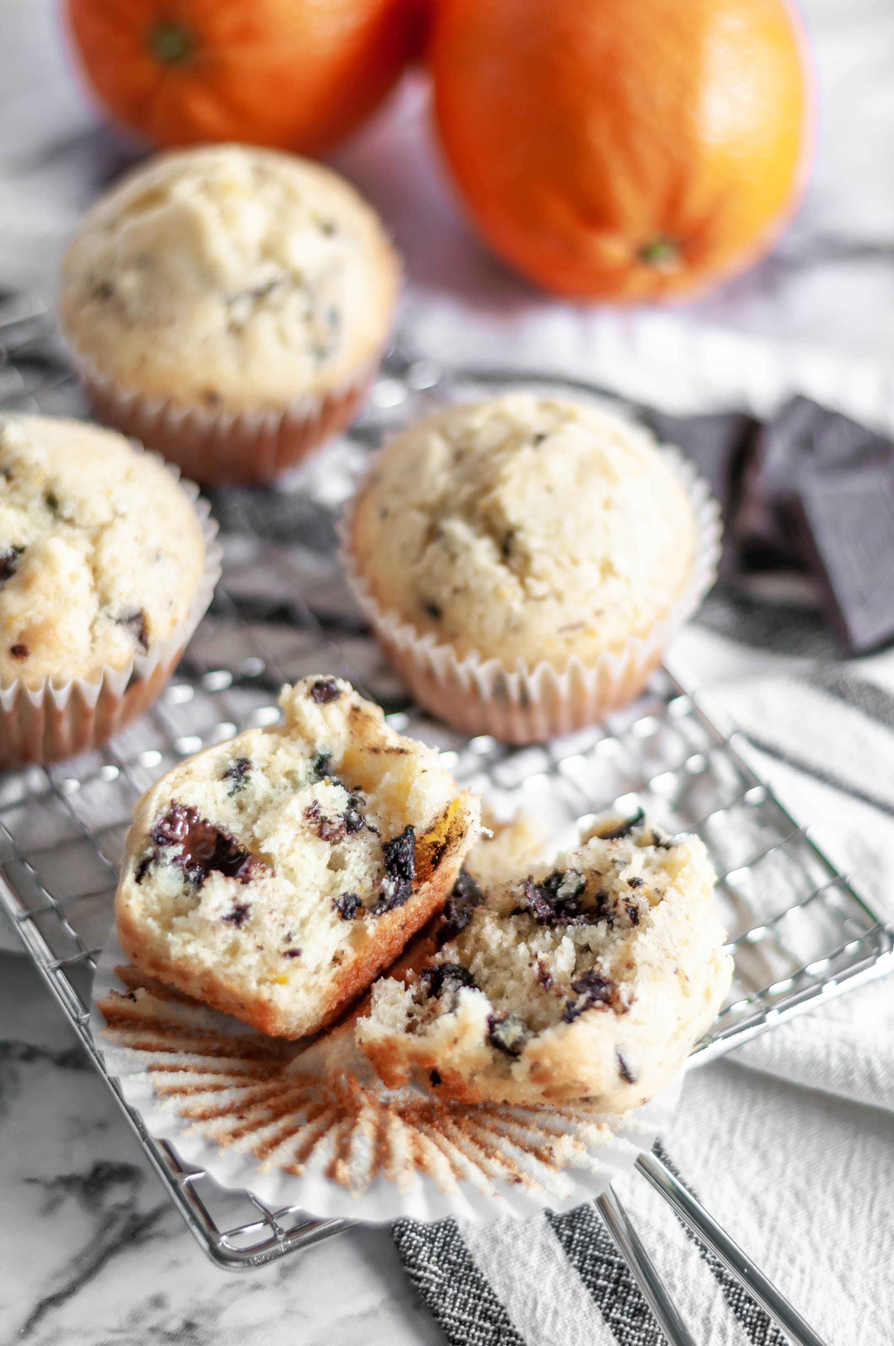 Orange Chocolate Chunk Muffins are light and easy to mix up. Dotted with dark chocolate chunks and sweet orange zest.
