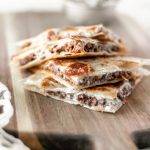 Black and Blue Quesadillas are packed with steak sauce drenched ground beef, blue cheese crumbles and stringy mozzarella. The perfect 30 minute meal for busy weeknights.