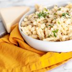 One Pot Parmesan Pasta is a simple pantry staple dish you can have on the table in less than 20 minutes. Serve this creamy Parmesan pasta as a side dish to any weeknight meal.
