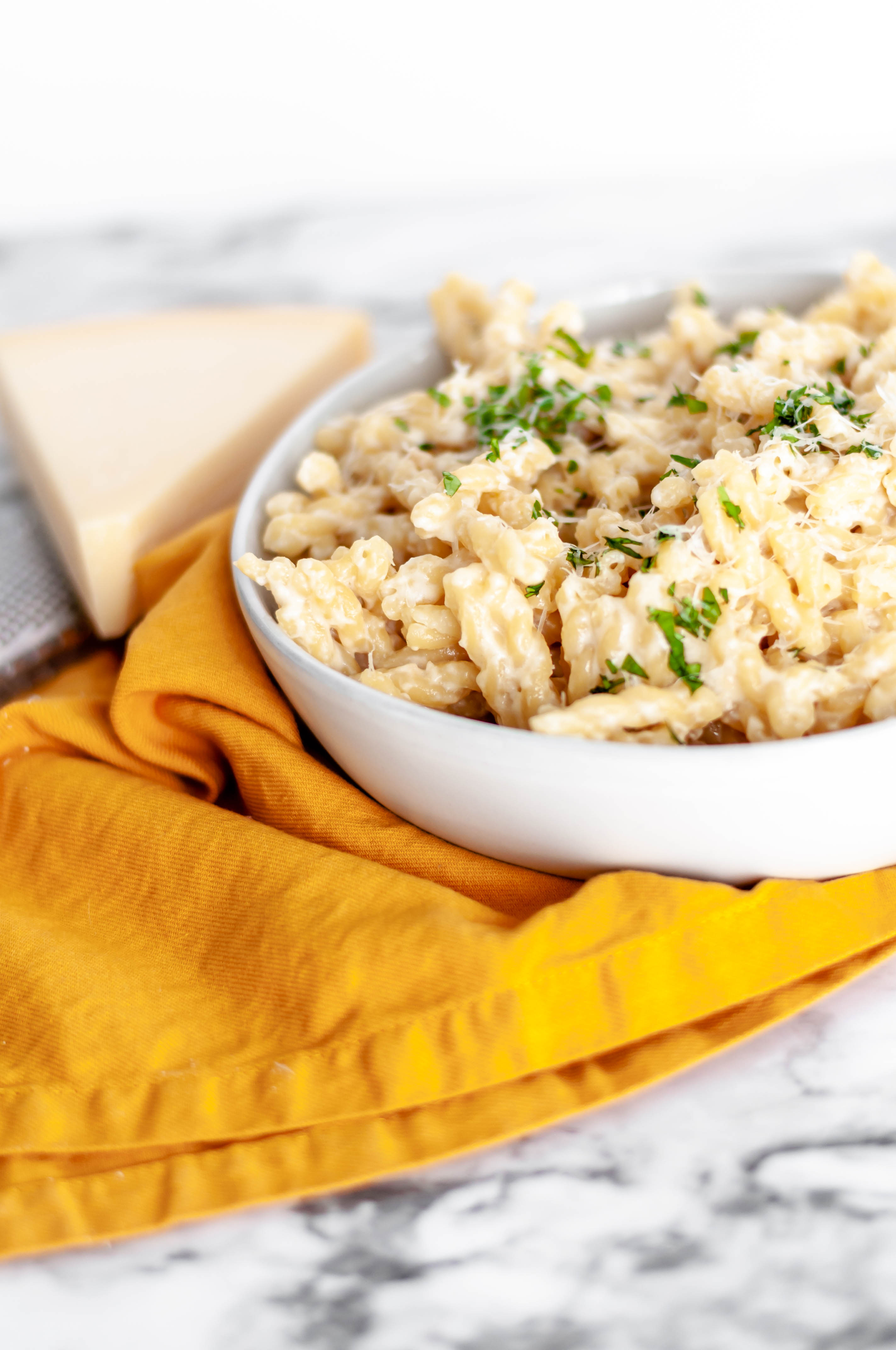 All you need is 20 minutes to make this One Pot Parmesan Pasta. Great as a side dish or add some grilled protein to make it a main dish. Perfectly creamy and super simple to make.