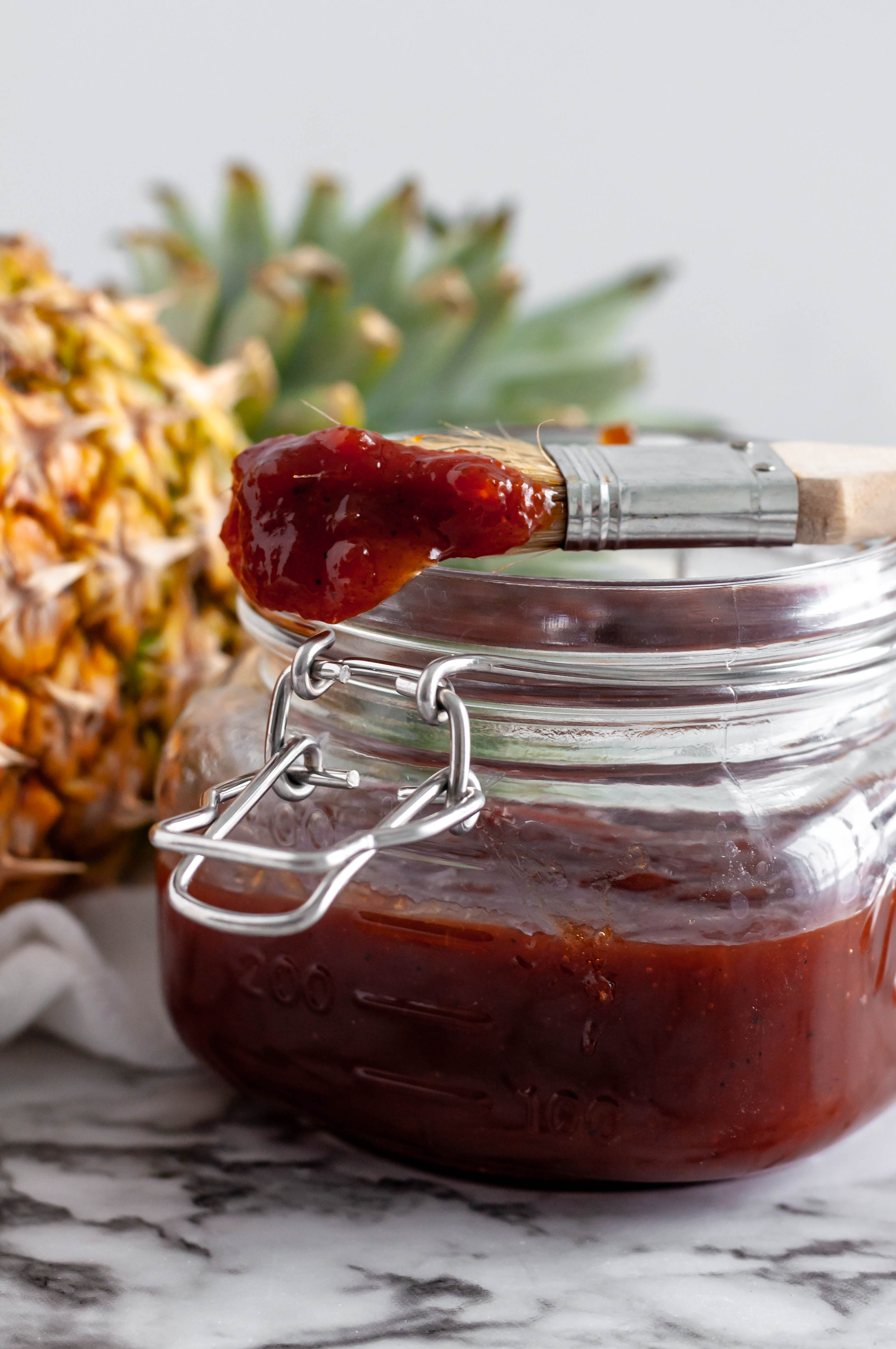 Pineapple BBQ Sauce is sweet, tangy and super simple to make. All you need is a handful of ingredients and less than 30 minutes for a thick, sweet sauce.