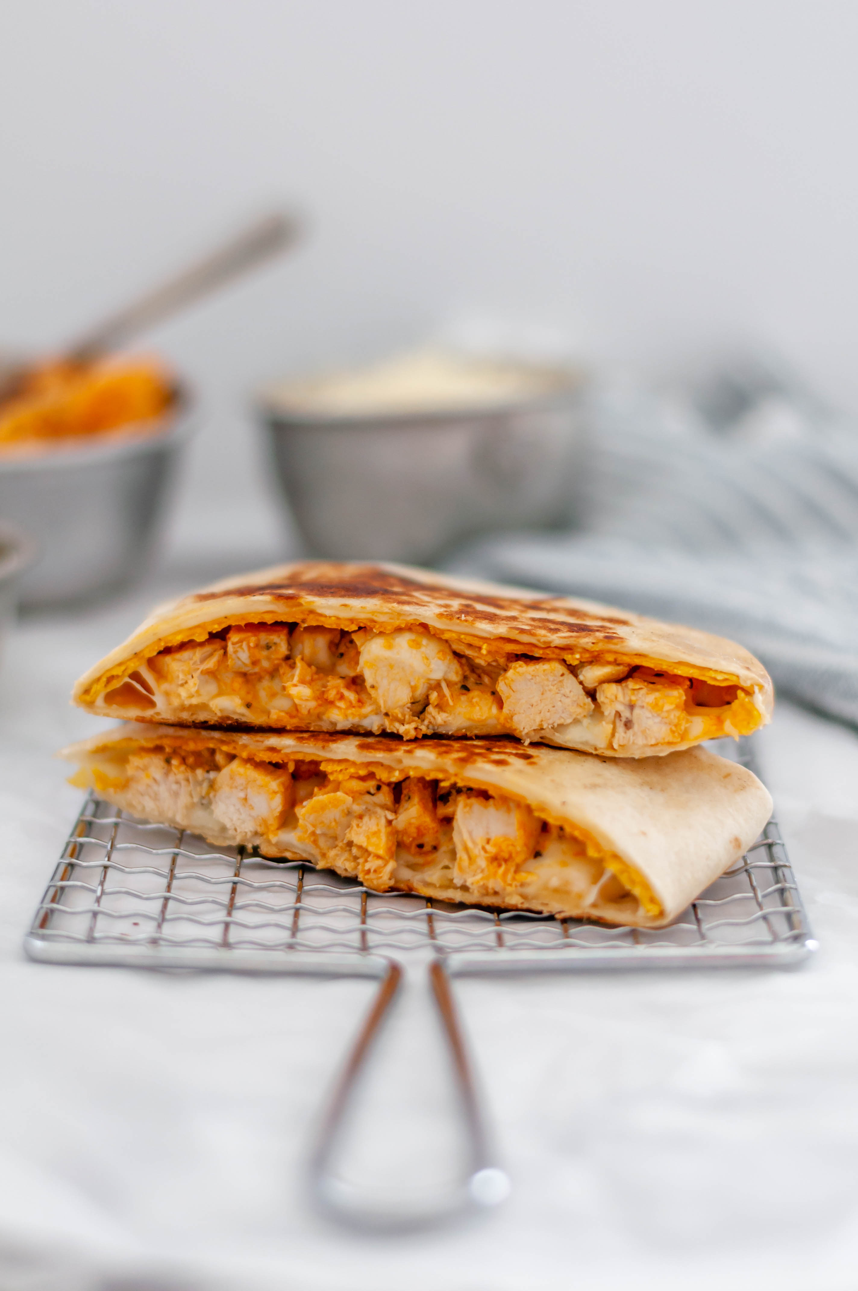 Meet your new craving, the Buffalo Chicken Crunch Wraps. Spicy buffalo chicken, mozzarella cheese, blue cheese and a crispy tostada shell all wrapped up in a soft flour tortilla and cooked to crispy perfection.