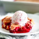 This Triple Strawberry Dump Cake is the perfect dessert for all your summer gatherings and potlucks. Just 4 simple ingredients to make this flavorful, texture filled cake.