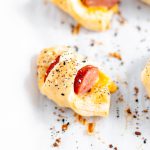 It's almost football season and that means it's time for all the football food and appetizer. Start the game with these Cheesy Pigs in a Blanket.