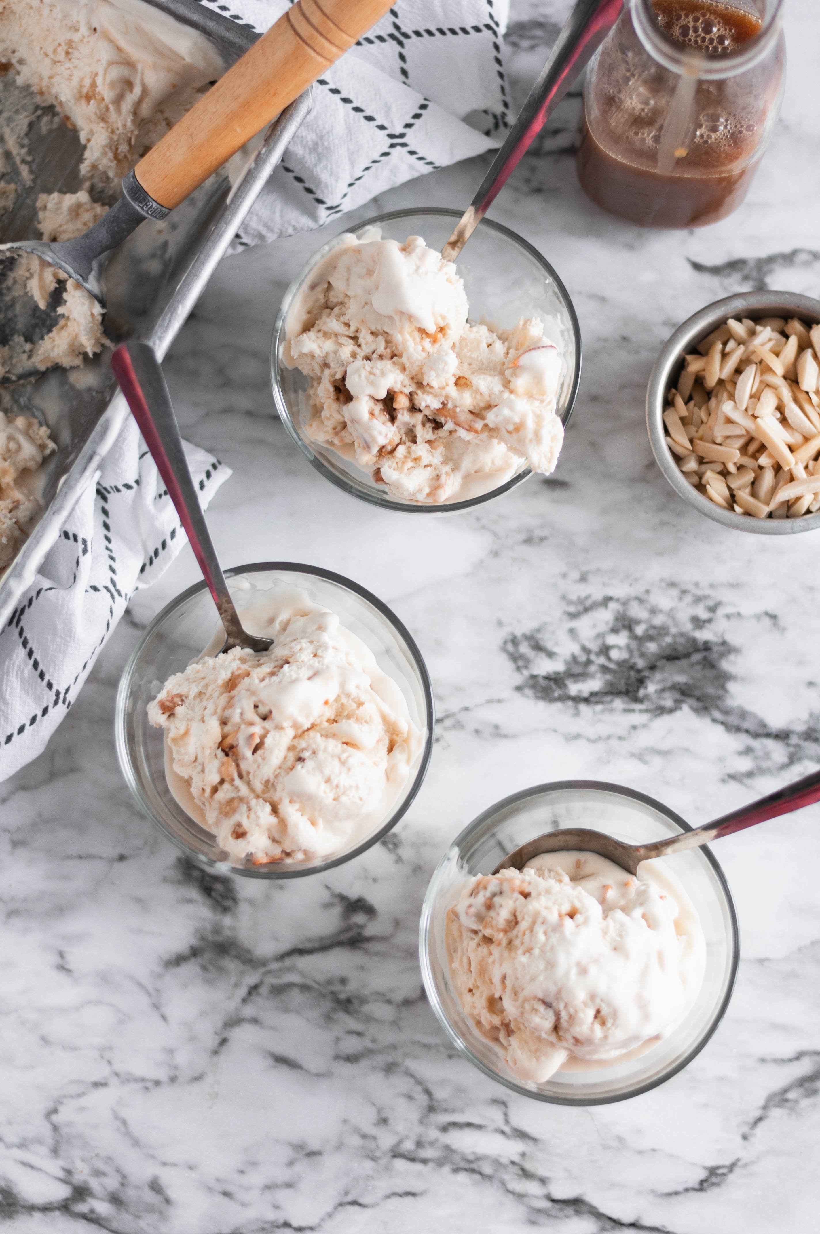 No ice cream machine needed to make this No Churn Caramel Ice Cream. It's packed with rich caramel and candied almonds for crunch.