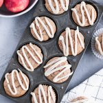 These apple muffins with cream cheese glaze are the perfect fall breakfast. Spice cake mix makes these simple to make and packed full of flavor. Grab your ingredients and get to baking.