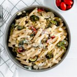 This Creamy Roasted Vegetable Pasta is a fast dinner option packed with flavor. Cheesy, creamy sauce, perfectly cooked pasta and flavorful roasted veggies.