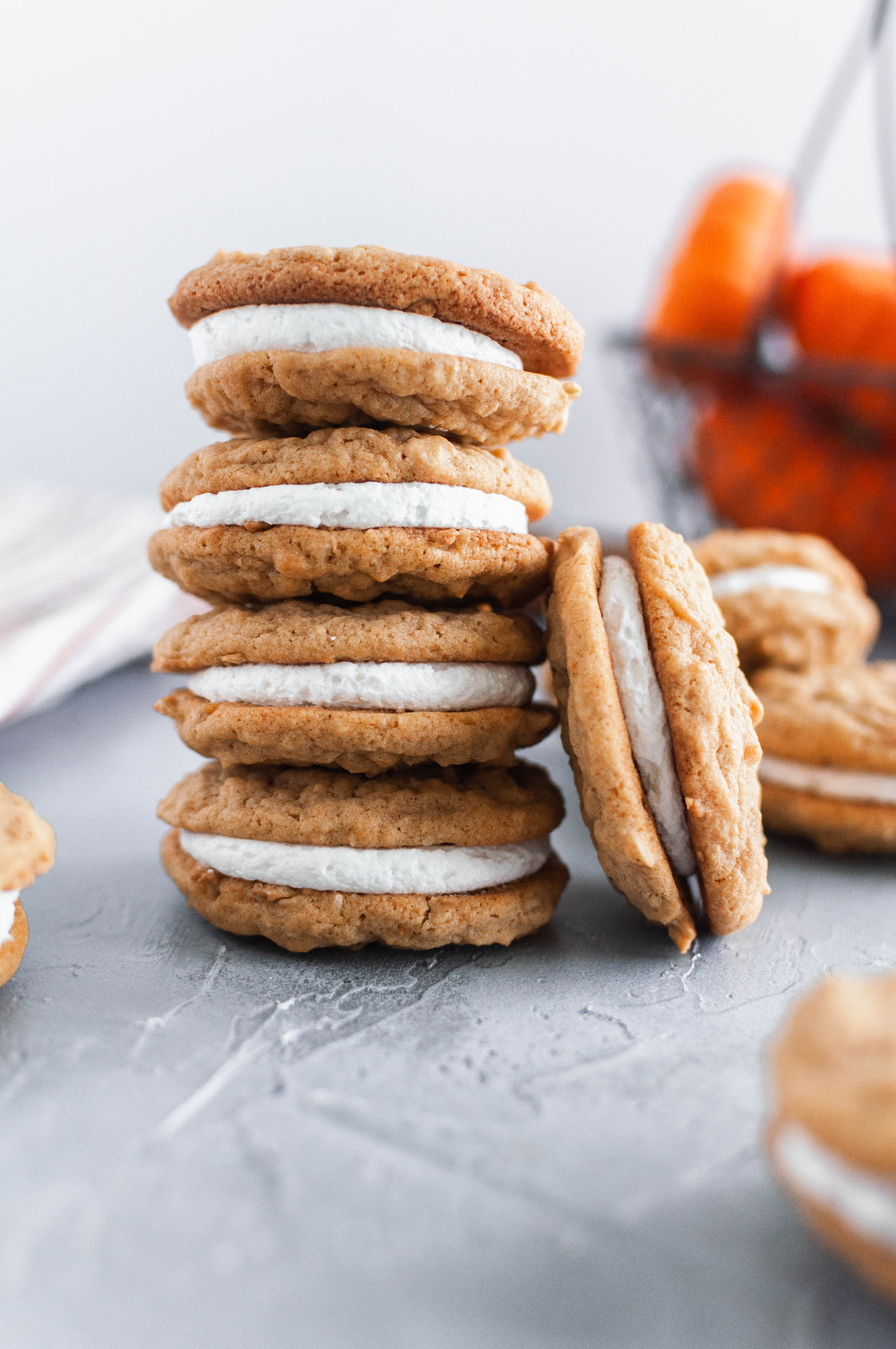 These Pumpkin Oatmeal Creme Pies will immediately become your new favorite fall dessert. Pumpkin oatmeal cookies with a fluffy marshmallow filling.