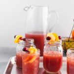 This Thanksgiving Punch is the perfect festive drink to serve on Thanksgiving. Cranberry juice, orange juice, apple cider and ginger beer create a deliciously addictive punch. Spiced rum optional.