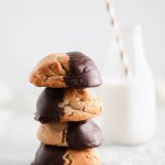 These giant Chocolate Peanut Butter Cookies are perfect for your Christmas cookie baking. Rich, chewy peanut butter cookies dipped in melted chocolate.